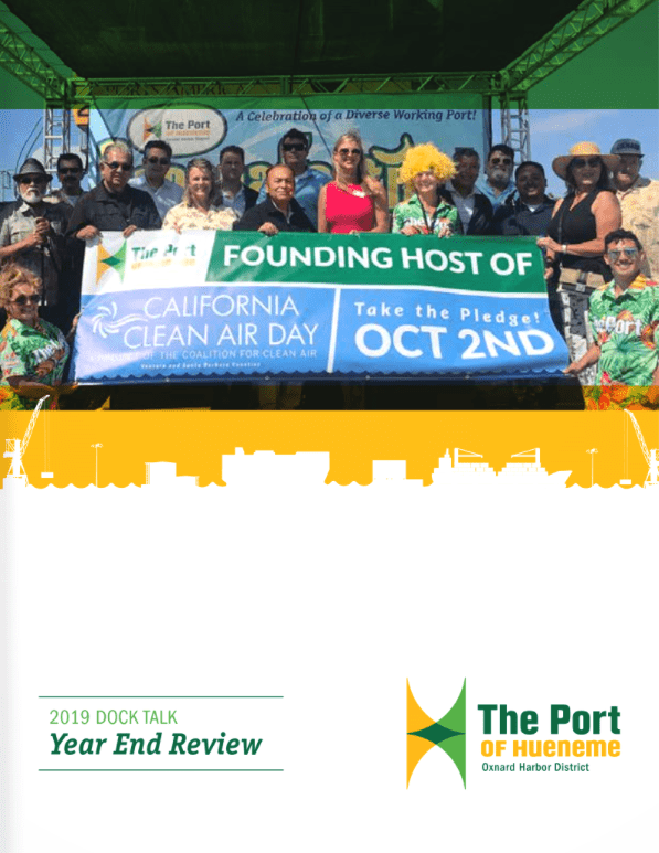 A group of people on stage holds a banner promoting California Clean Air Day. The bottom of the image features text about the 2019 Dock Talk Year End Review Newsletter for The Port of Hueneme, Oxnard Harbor District.